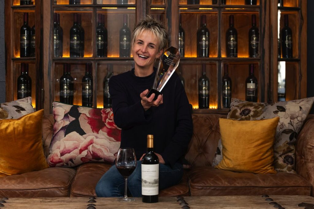 Narina Cloete, head winemaker at Blaauwklippen Estate, with the Woman Winemaker of the Year trophy that she received at the LUMO Awards. 
Photo: Livingstone Louw Photography