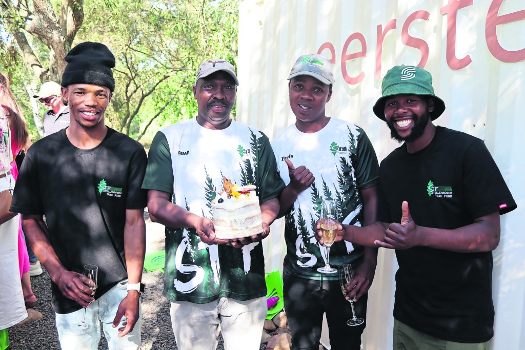 Maliwa Asiphilele, Simlindile Gomeni, Msophi Ayabonga and Mfazwe Mziwamaoloda of the Stellenbosch Trail Fund, who keep the Art Mile neat, tidy and accessible to visitors had their own cake to decorate for the birthday celebrations.