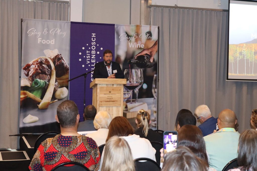Michael Ratcliffe, chairperson of Visit Stellenbosch, at the podium.  Photo: Yaël Malgas