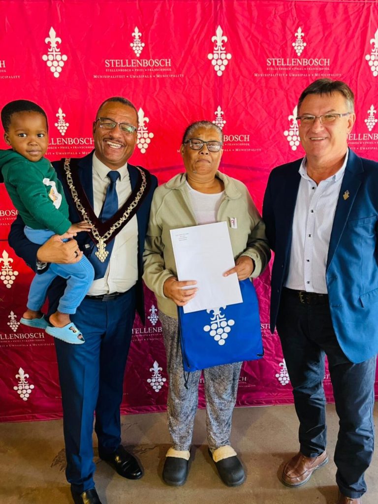 Title deed handover to 63 residents of Khayamandi by Stellenbosch Municipality at Amazink.