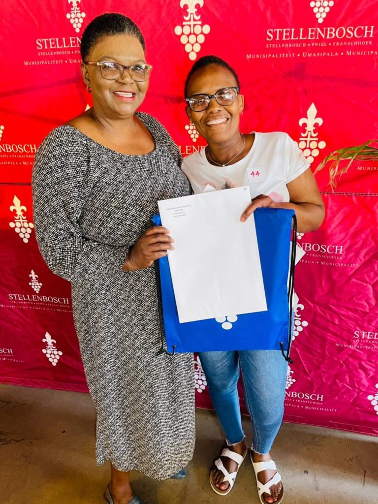 Title deed handover to 63 residents of Khayamandi by Stellenbosch Municipality at Amazink.