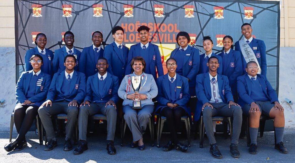 Lückhoff High School's team captains and principal Charlene Holding.