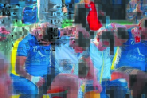 Head defends players