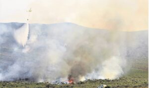 Brand ruk berge in, om Kleinmond
