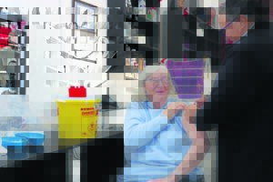 Hairdresser makes salon vaccination site