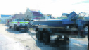 Five arrested, boat held