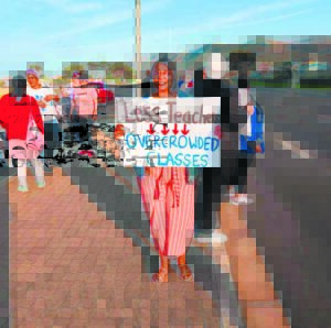 Teachers protest job losses