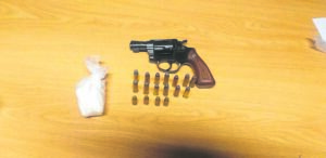 Gun, ammo and drugs seized