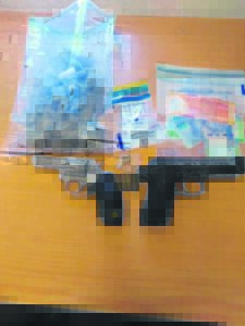 Drugs, firearm confiscated