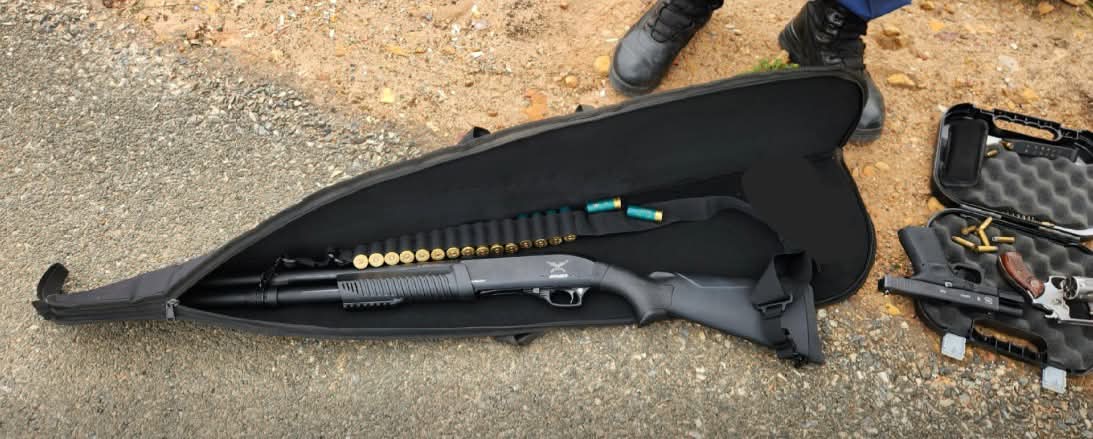 A search of the suspect and vehicle reportedly yielded a .38 revolver, a 9 mm pistol, a shotgun and ammunition for all three firearms.