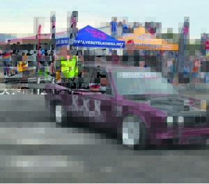 Car enthusiasts spin wheels to raise funds