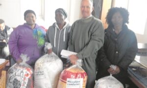 CSS hands out comforters for the poor during AGM