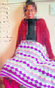 Elderly volunteer knits blankets for terminally ill patients