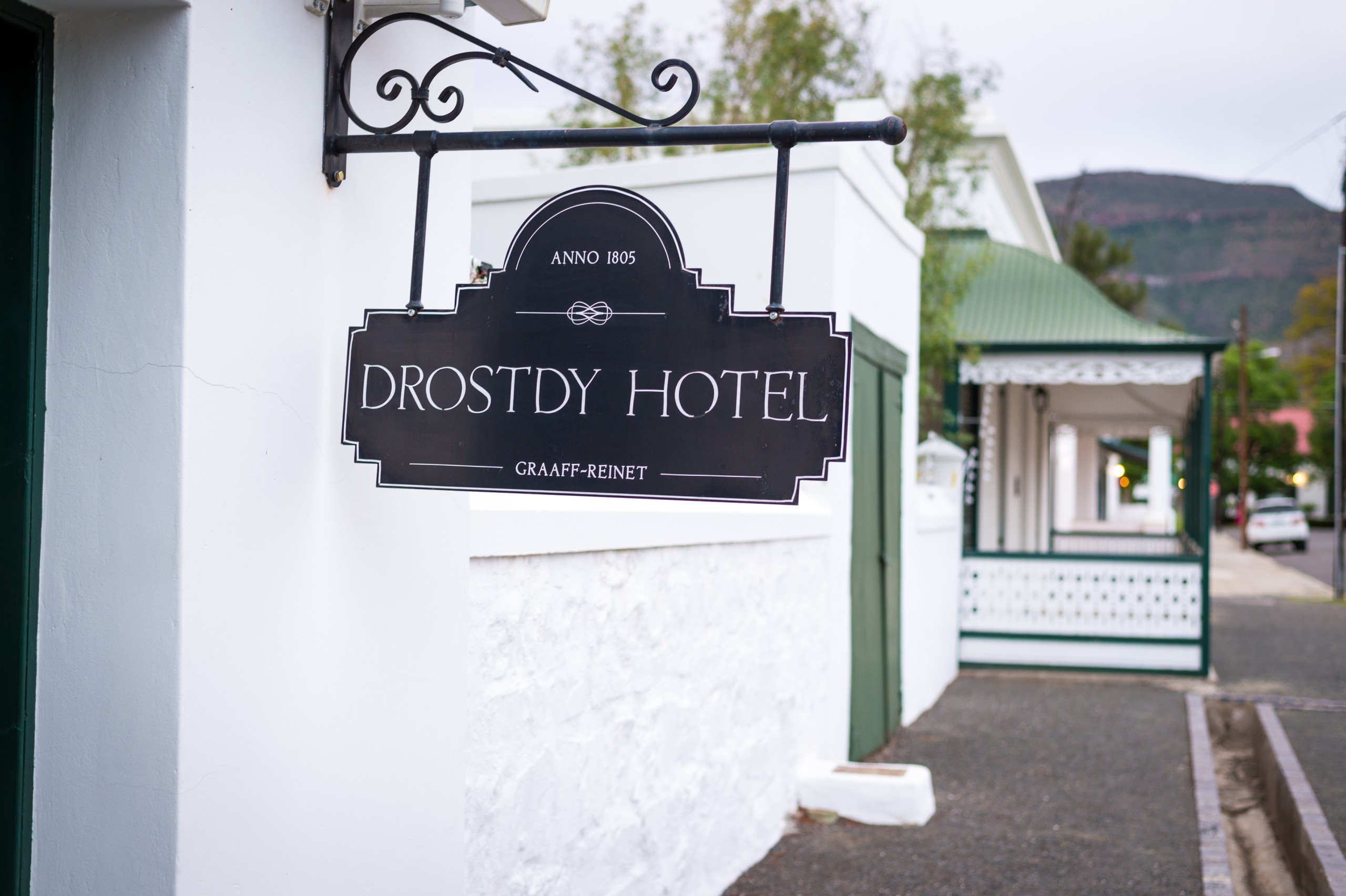 A placard with the words Drostdy Hotel.