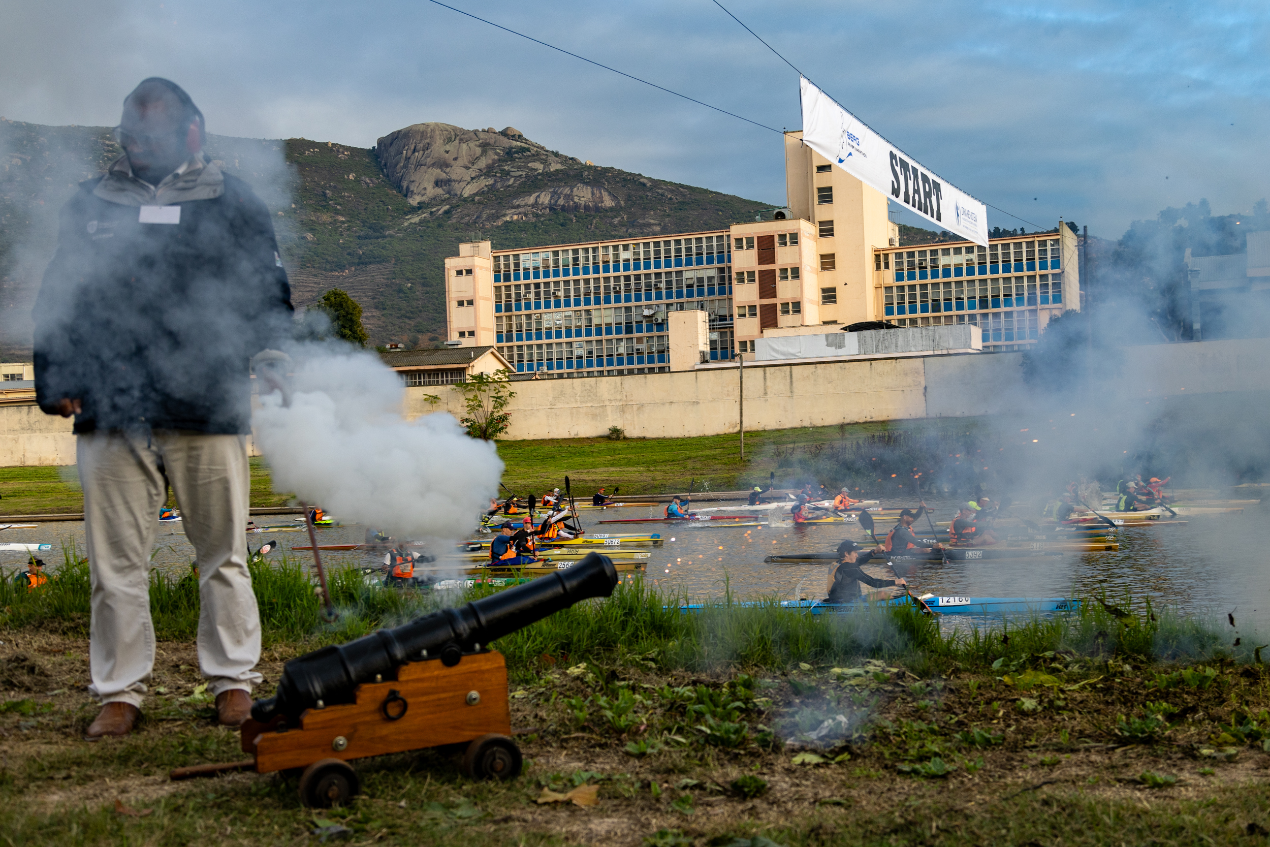 The cannon fires in Paarl to send the paddlers off on Day 1 of the Berg River Canoe Marathon.