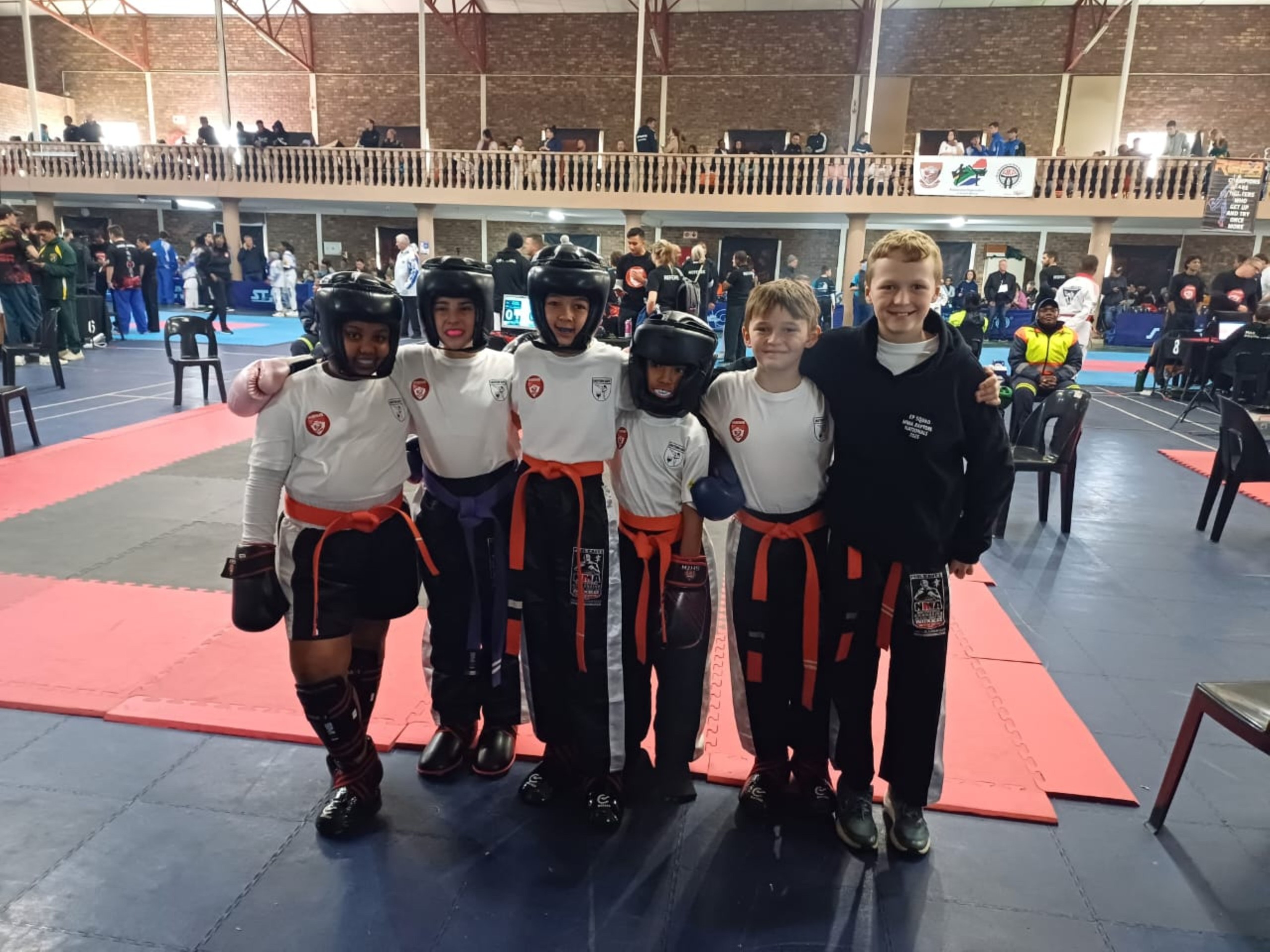 A group of young people at a sports event.