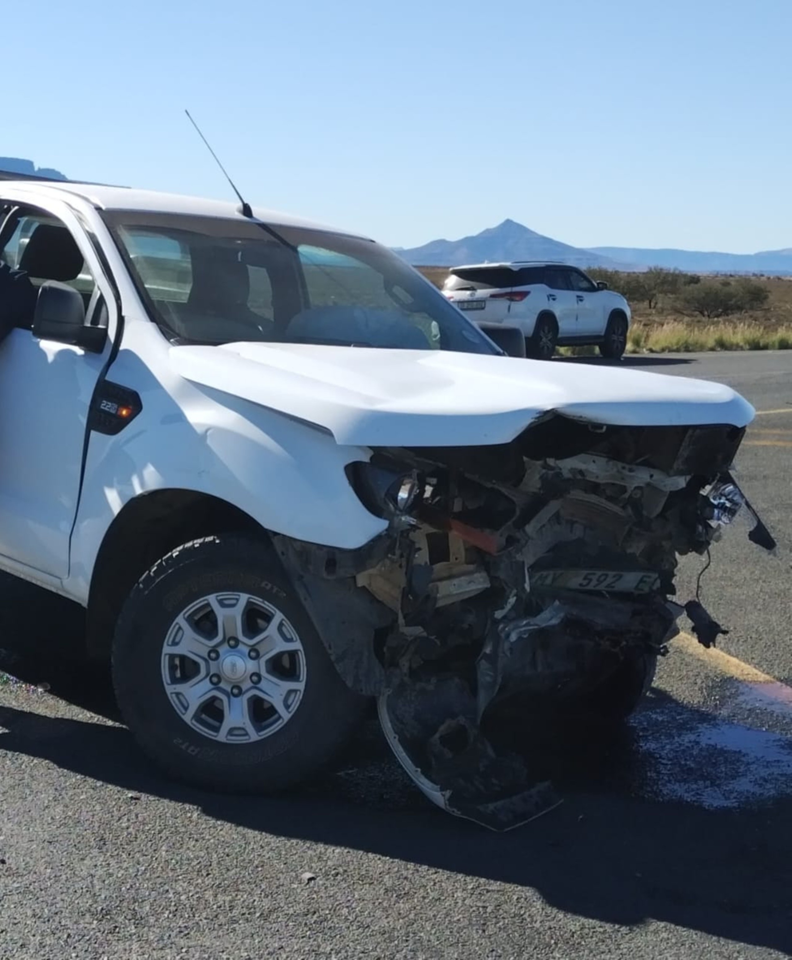 A white Ford Ranger after a crash.