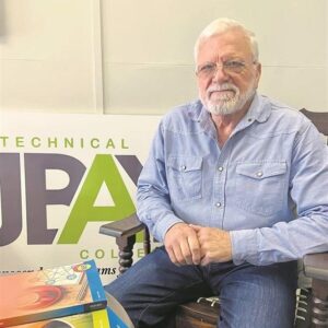 Local lecturer writes successful mathematics textbook series