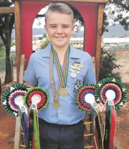 Xavier ryg medaljes in