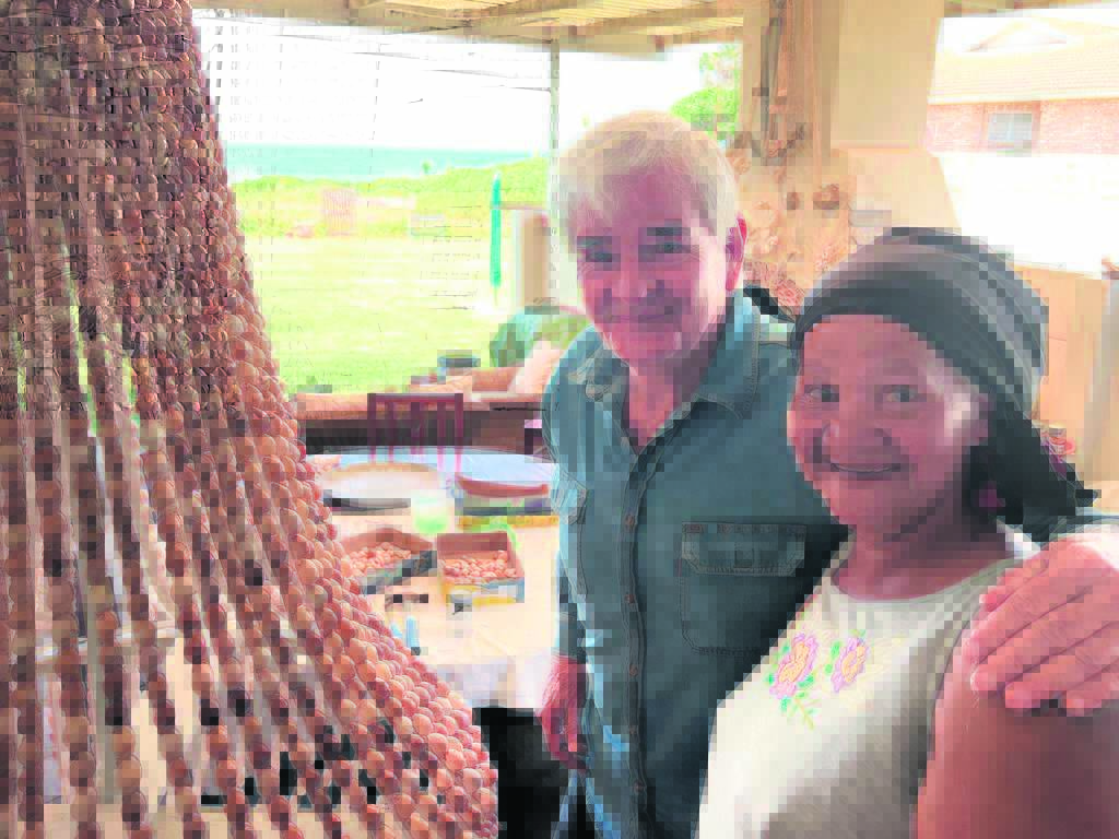 Local sea shell enthusiasts create 2m-tall chandel