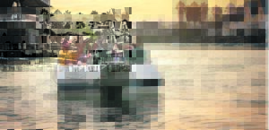 Enjoy a glass of wine on the canals