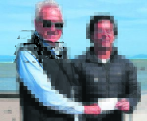 Revered local surfer receives donation