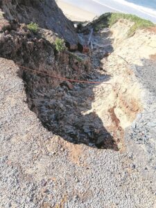 Large hole in Paradise Beach continues to expand