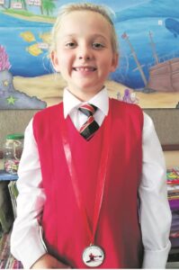 Leerder roei vir medalje