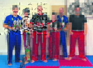 Local kickboxing academy excels at championships