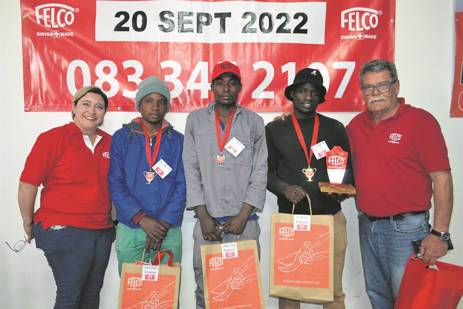 Champions of pruning and picking competition crown