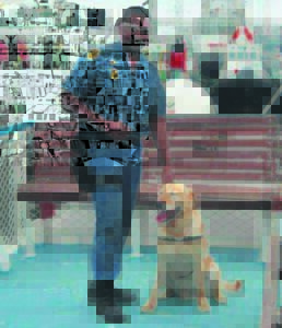 Top K9 officer hands in EC badge