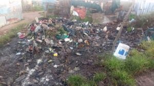 Informal settlement residents battle with overflow of waste