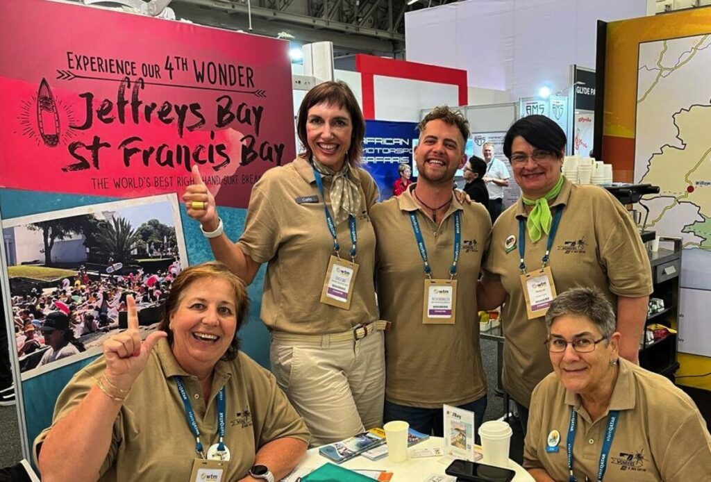 A picture of five people who were representatives of the 7 wonders at the Cape Town World Travel Market.