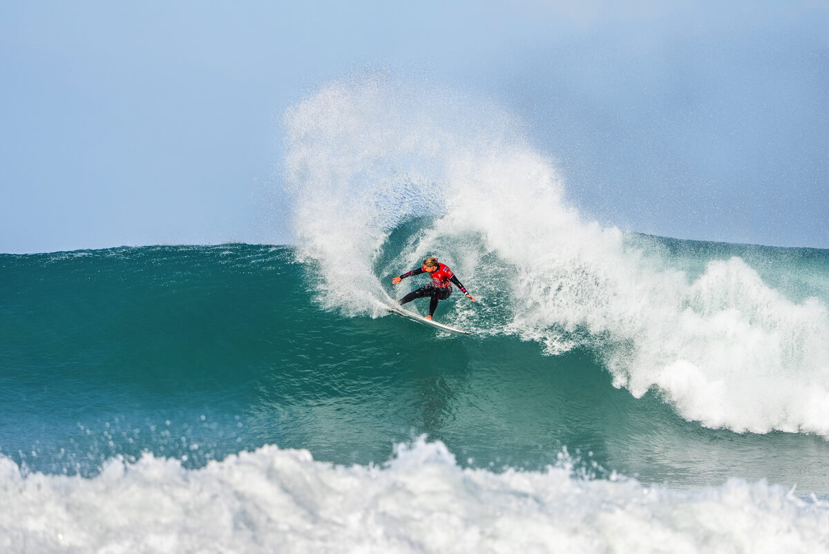Gabriela Bryan surfing.