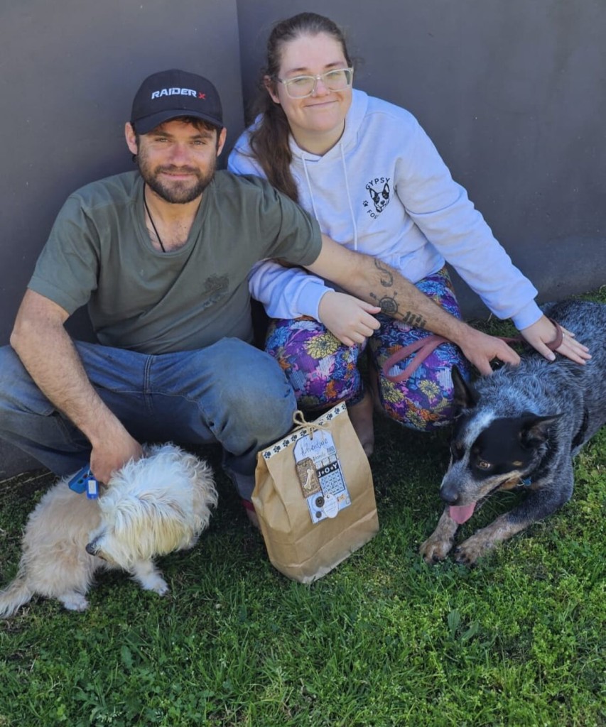 Tyler Pelser and Danell Harmse with the their two dogs.