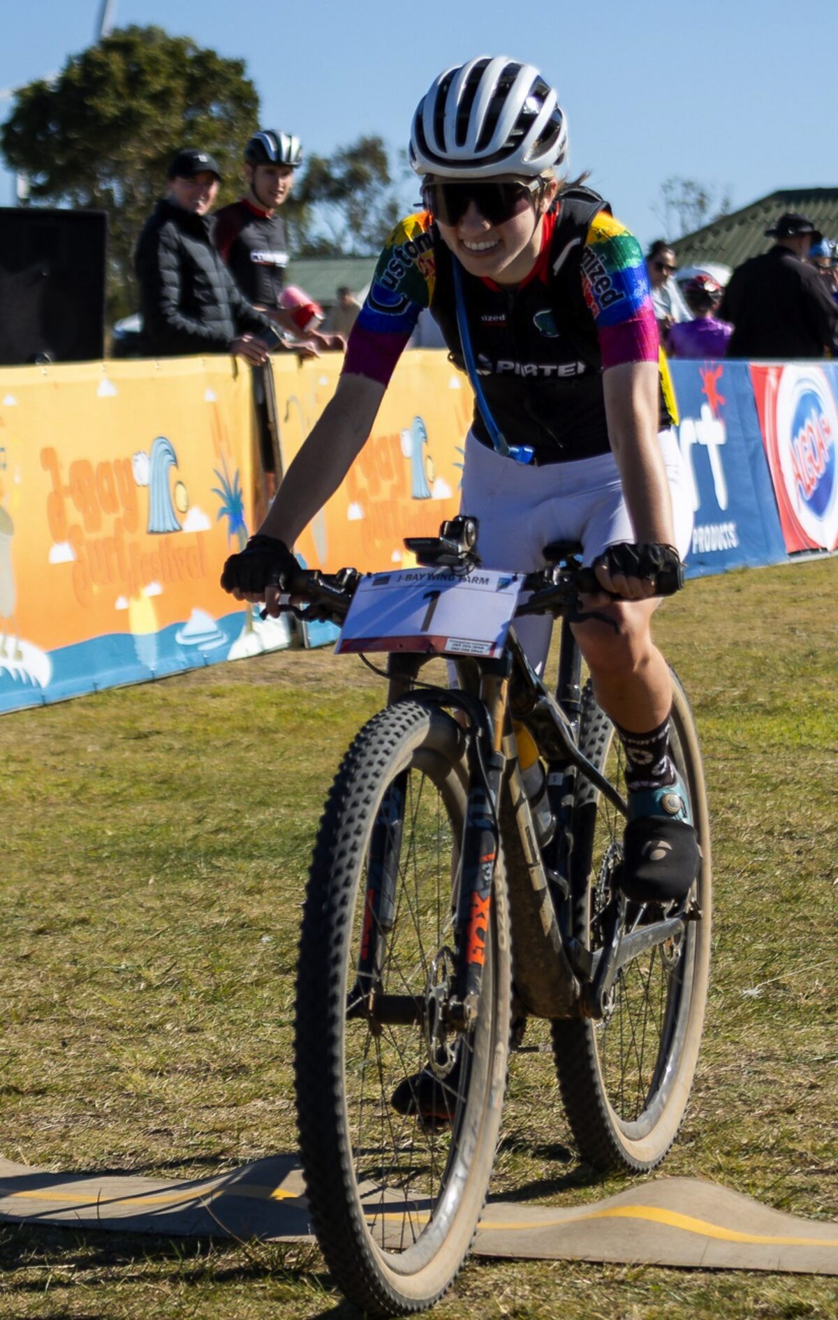 Kelsey Van Schoor on a bicycle.