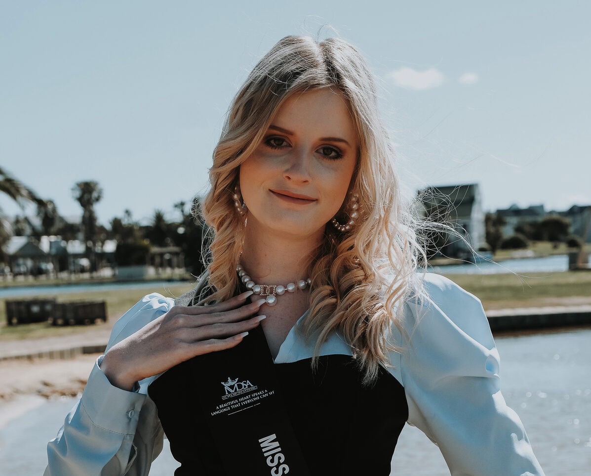 Quindeny Louw with a Miss Deaf South Africa sash on.