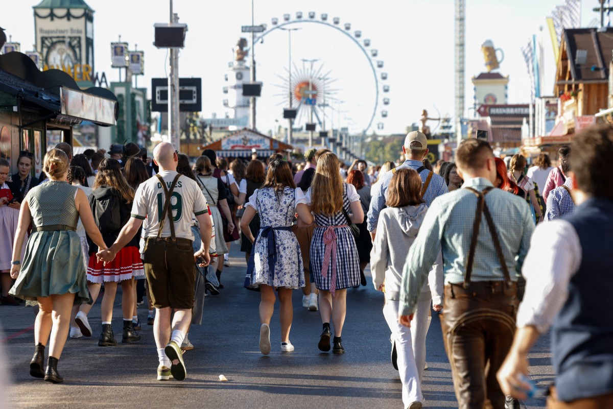 Authorities shuttered Germany’s world-famous Oktoberfest on Wednesday following a bomb threat linked to a deadly family dispute that left one person dead and a residential building rigged with explosives in flames.