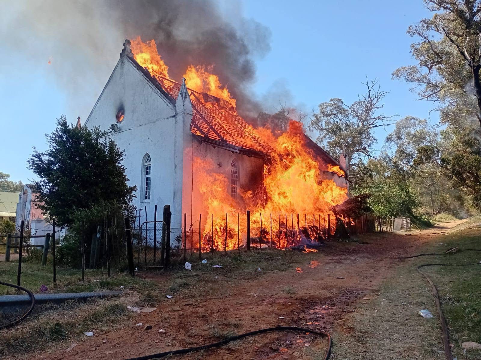 A church building on fire.