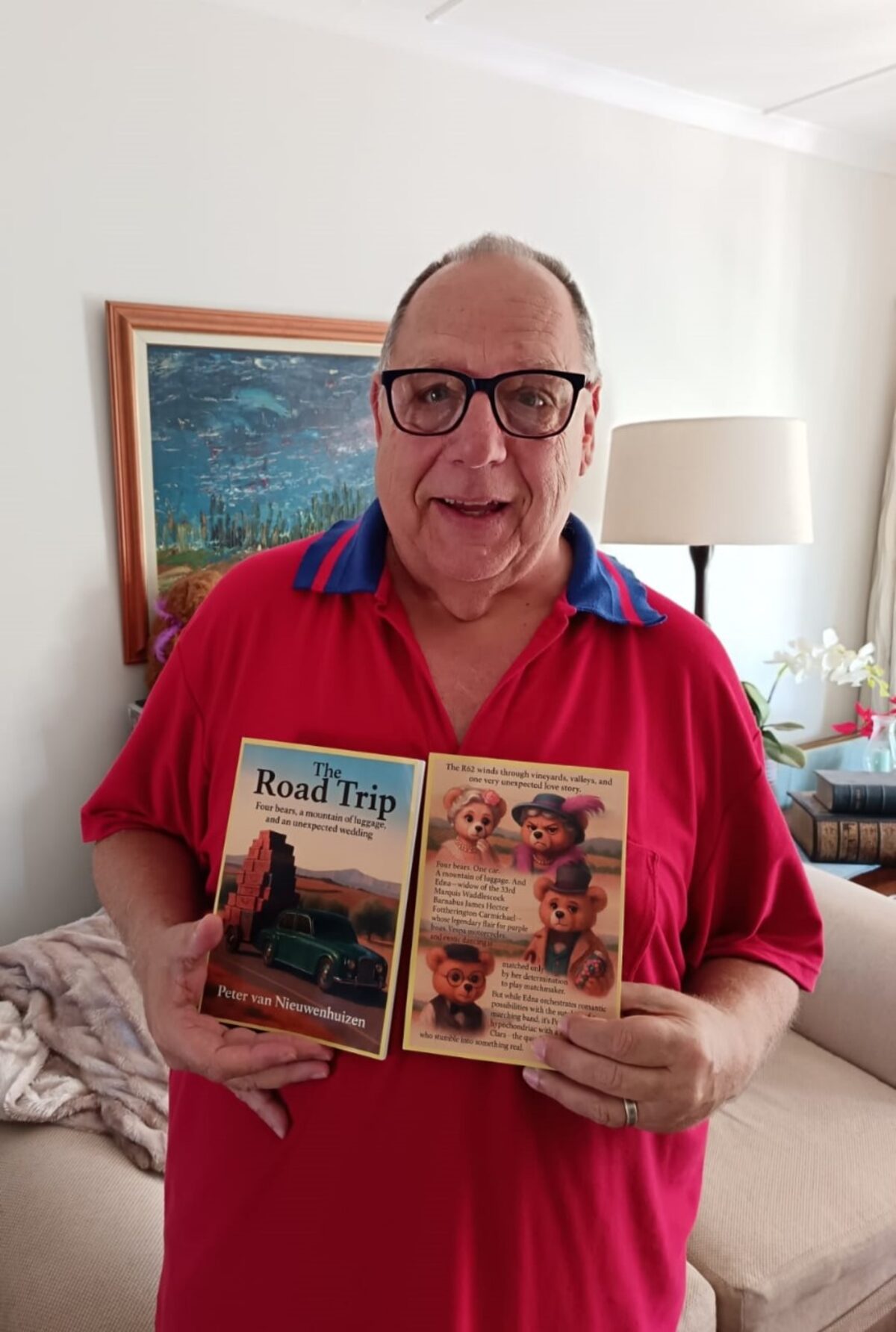 Peter van Nieuwenhuizen holding his newly published book.