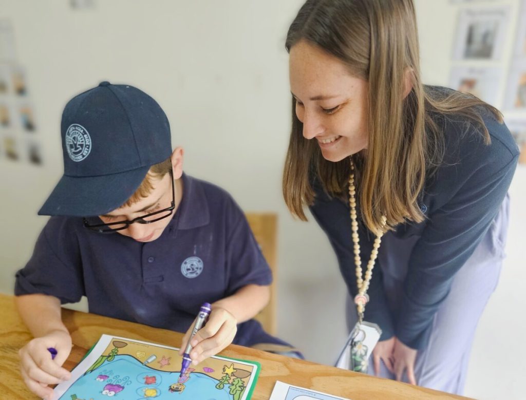 Chrisja Pretorius (Special Needs Educator) with one of the learners at the school.