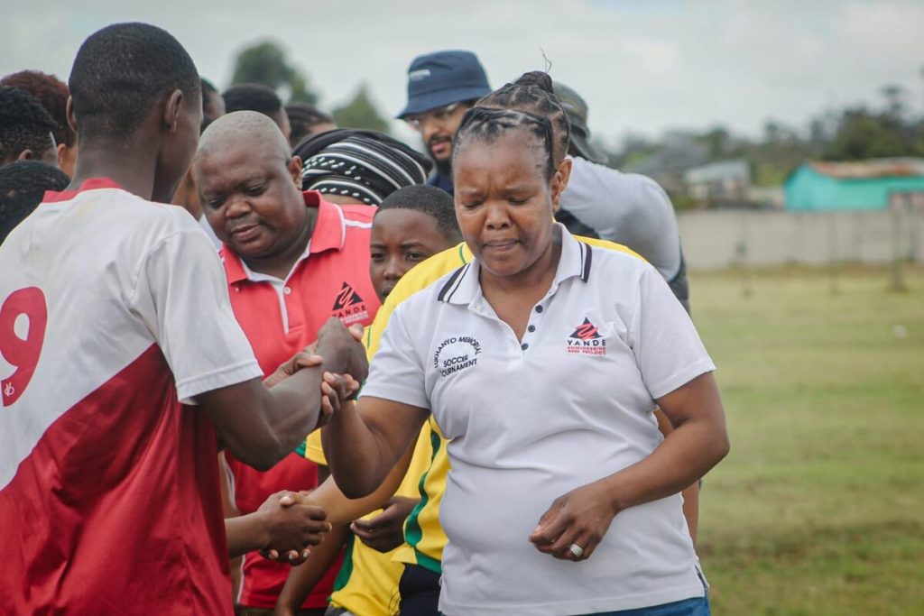 Zoleka Kota greeting the players at the Lukhanyo Memorial Speed Awareness Campaign Soccer and Netball Tournament.