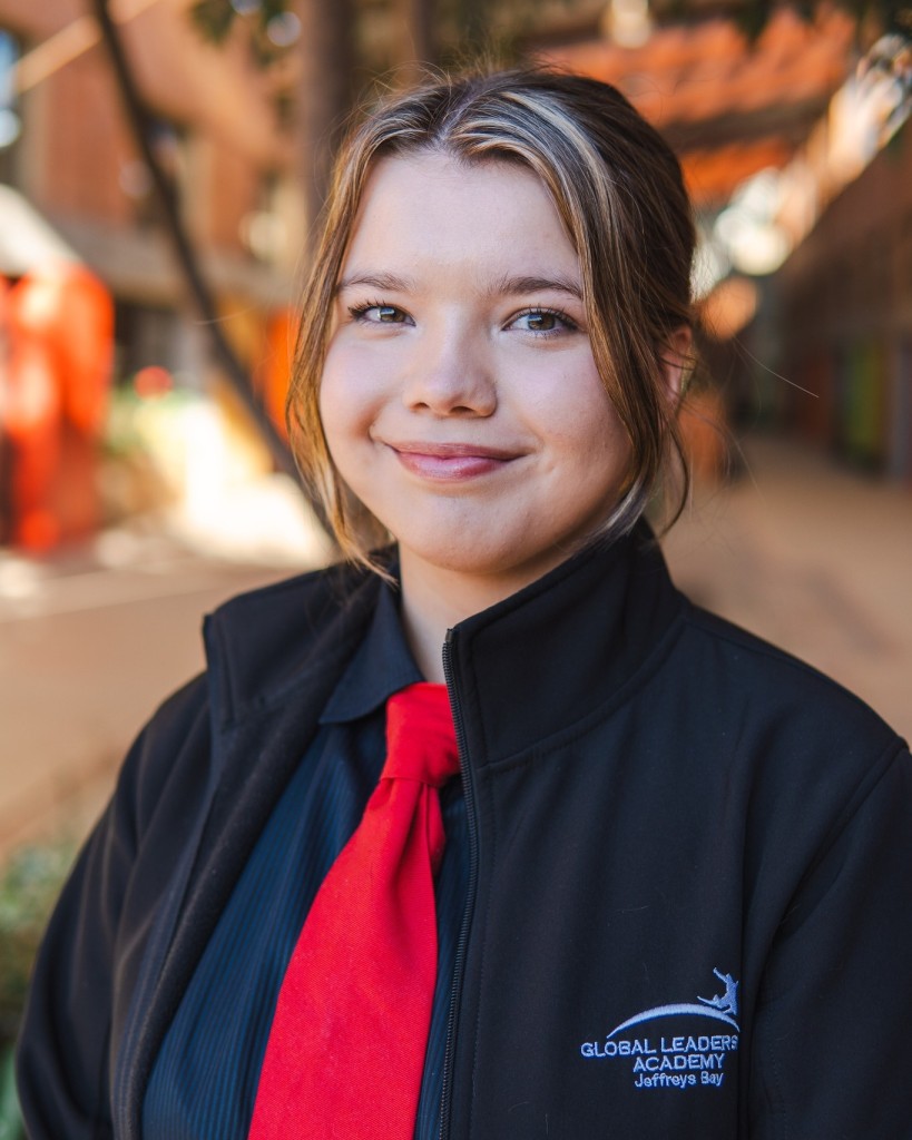 Kiarah de Wet wearing school uniform.