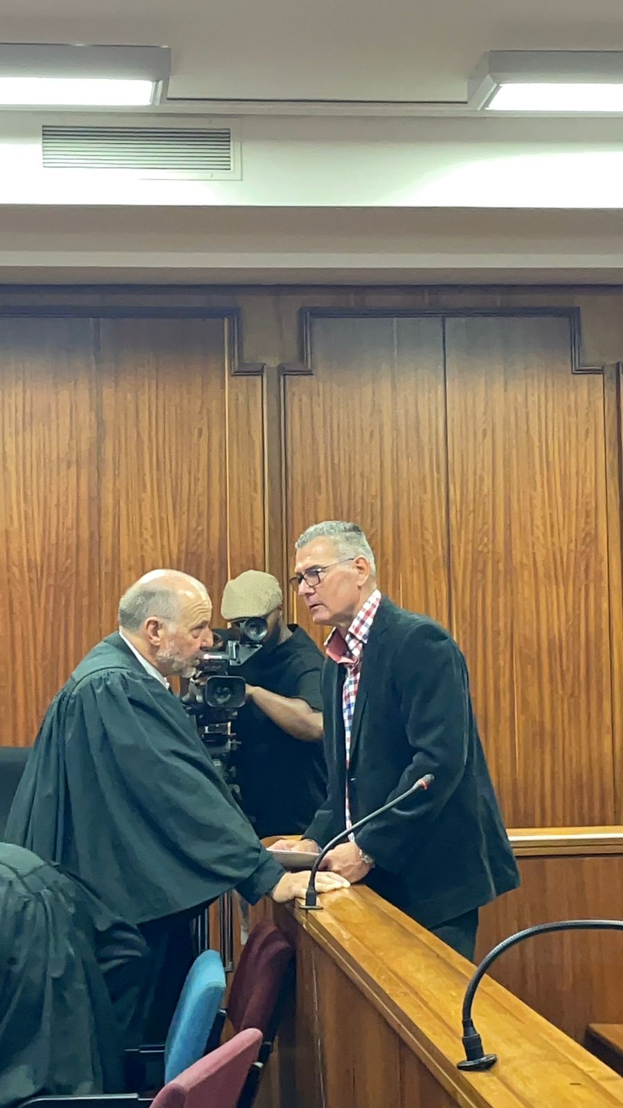 Arnold Terblanche talking to his legal representative in the Gqerha High Court.