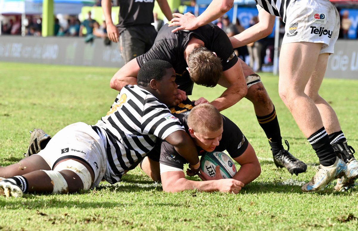 Jeppe weathered the Boland storm to gain a famous victory for the Black and White.