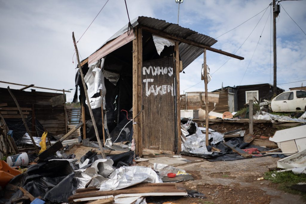 Houses destroyed in anti-migrant attacks in KwaNonqaba, Mossel Bay. Photo: Rodger Bosch/AFP