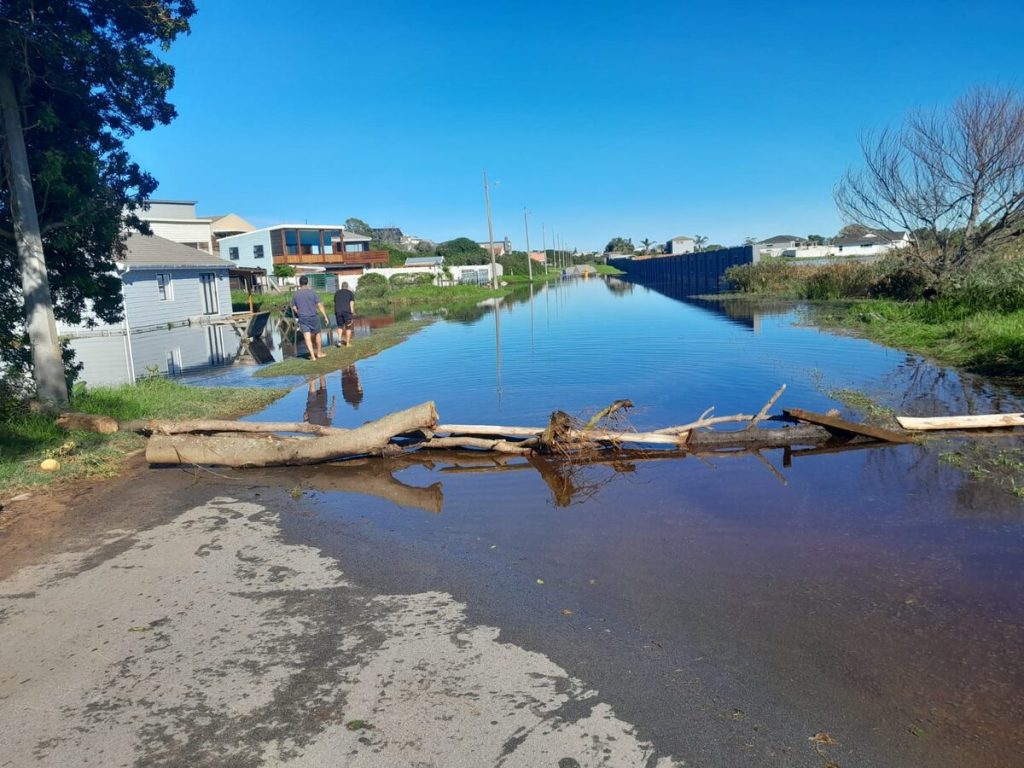 Flooded yard and road in Johan Muller Boulevard, Paradise Beach, following heavy June rainfall in the Kouga area.