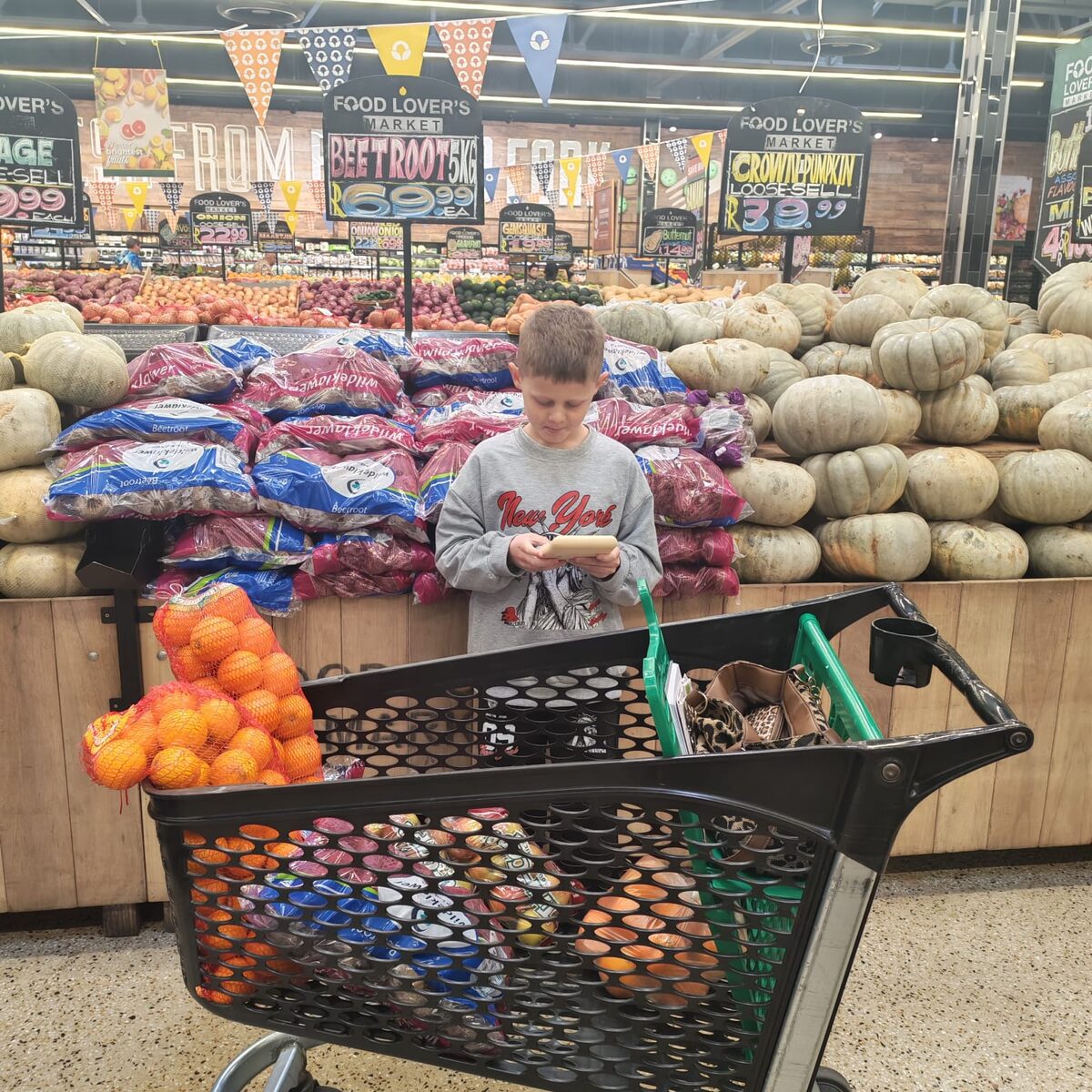 Grade 5 learner Caleb Vlok with donations collected for African Dawn Bird and Wildlife Sanctuary.