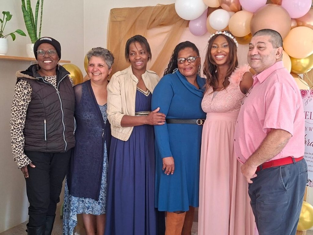 Heraldine Fisse celebrates completing matric at Kareedouw Online farewell.