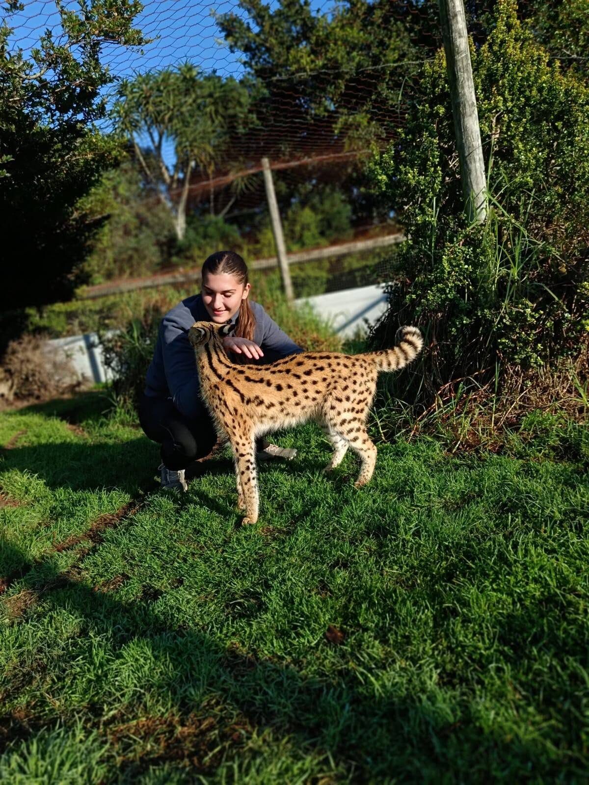 Italian volunteer Caterina Giovinetti caring for rescued animals at African Dawn Bird and Wildlife Sanctuary.